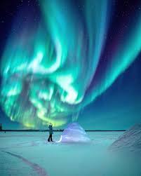 The aurora borealis, or northern lights, are an ethereal display of colored lights shimmering across the night sky. Aurora Borealis Over Canada Pics