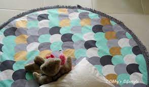 Round quilted baby play mat. Libby S Lifestyle Padded Baby Play Mat Tutorial The Quickest And Easiest Diy Baby Gift Imaginable