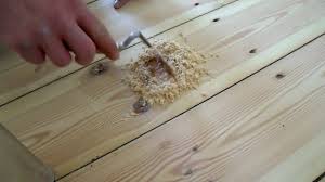sanding floorboards hammering in nails