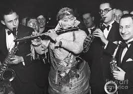 They are wealthy, successful, make good. Musicians Playing At German Cabaret By Bettmann