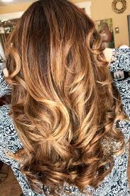 This ombre balayage blend is simply stunning paired with soft curls and long layers. 35 Flirty And Effortless Ways To Rock Golden Brown Hair