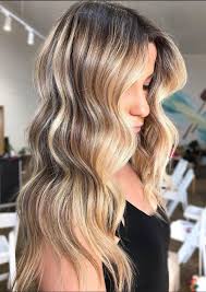 Cosmopolitan uk's round up of the best blonde highlights from platinum to caramel, half head, to full head. Beautiful Blonde Hair Colors For 2021 Dirty Honey Dark Blonde And More Southern Living
