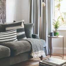 grey sofa interior stylists