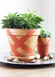 diy geometric painted terracotta pots