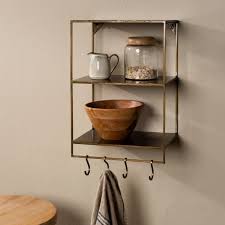 Meghana Brass Wall Shelf With Hooks