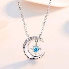 crescent moon with star pendant