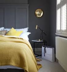 The terra cotta herringbone floor tiles are a nice transition. 25 Cool Grey And Yellow Bedrooms That Invite In Digsdigs