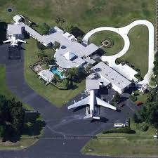 Travolta is an avid aviator, and his aircraft collection includes a pristine boeing 707 that he's restored in the livery of a vintage quantas airliner John Travolta Kelly Preston S House In Anthony Fl Google Maps