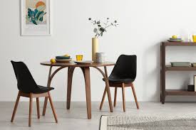 A single person can extend the table and there's plenty of room for chairs since the legs are always located at the corners of the table. Set Of 2 Thelma Dining Chairs Dark Stain Oak And Black Made Com