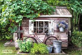 Rustic Shed With Garden Shutters And