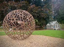 large horseshoe sphere garden sculpture