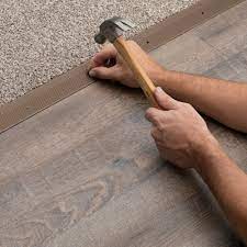 metal carpet trim in the floor moulding