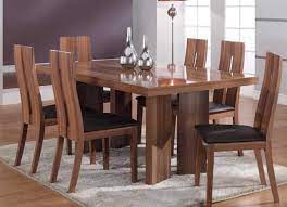 Folding tables and folding chairs are great space savers and can be easily stowed away when not in use. 10 Remarkable Dining Tables That Will Steal Your Neighbors Attention Modern Dining Tables Wooden Dining Room Table Wooden Dining Table Designs Wooden Dining Tables