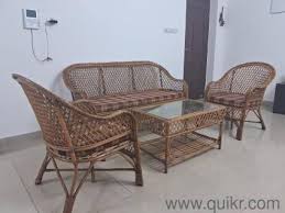 cane furniture with center table in
