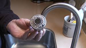 how to clean kitchen faucet head