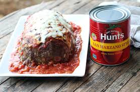 Transfer meatloaf into large baking dish and pour sauce over it. Italian Style Meatloaf With Garlic Tomato Sauce Buy This Cook That