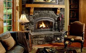 Flush with the wall, the fireplace has a raised hearth that projects into the room. The First Steps In Building An All Natural Stone Fireplace Off The Grid News