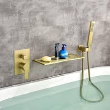 Flg Single Handle Wall Mount Roman Tub Faucet With Hand Shower Brass Waterfall Bath Tub Filler With Sprayer In Brushed Gold