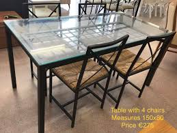 Glass Topped Table 4 Chairs A Time