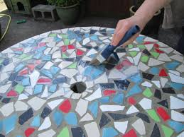 a mosaic table top with ceramic tiles