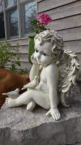Thinking Cherub And Doves Garden Statue