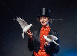 smiling female magician with two white