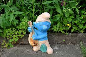large smurf garden gnome with mandolin