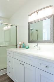 This wooden framed mirror matches the bayshore vanity collection for a coordinated look. Kraftmaid Residential Kitchen California Woodworking