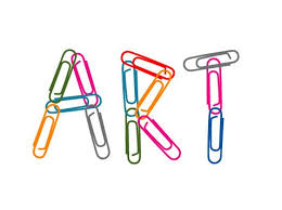Image of art spelled in colorful paperclips