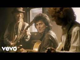 the traveling wilburys end of the