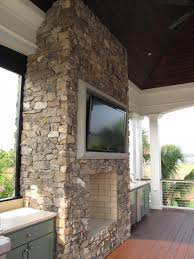 Outdoor Tv And Firpelace Transitional