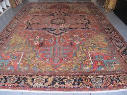 large antique heriz carpet with pale