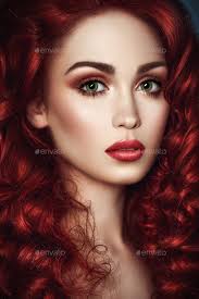 redhead woman with green eyes stock