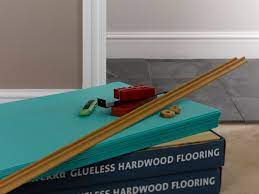 laying wood and laminate floors