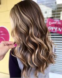 This golden blonde haircolor is the perfect way to go blonde but stay low maintenance. Sunkissed Beachy Highlights That Work For Every Hair Color Southern Living