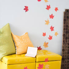 using fall leaves as seasonal wall art