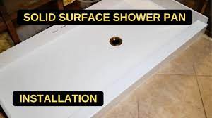 solid surface shower pan installation