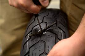 how to repair a flat tire on the road