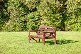 Wooden Bench In A Nature Park In