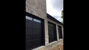 recessed panel black garage doors