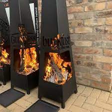 It burns wood and is well enclosed, so fire sparks or embers cannot escape the firehouse. Christmas Gift Fire Pit Garden Chiminea Patio Heater Outdoor Firepit Pyramid Ebay
