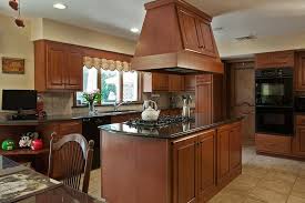 pair countertop colors with dark cabinets