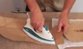 remove candle wax from carpet with a