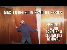 removing wood paneling and tile ceiling
