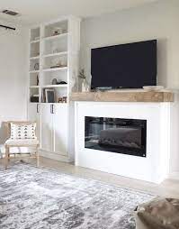Electric fireplace mantles are a easy way to take your electric fireplace from just a clever h… Diy Modern Fireplace Designed Simple