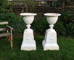 antique cast iron urns and pedestals