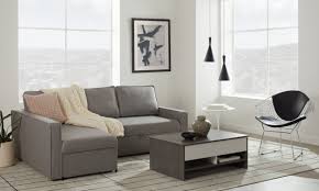 A small reclining sofa sectional for living rooms, made out of real leather in a black color with a chaise on the side. Small Sectional Sofas Couches For Small Spaces Overstock Com