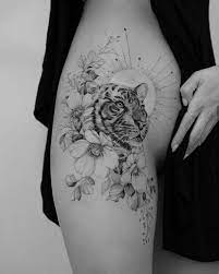 Tiger Tattoo | Tattoo Ideas and Inspiration | Tritoan | Thigh tattoos  women, Hip tattoos women, Animal tattoos for women