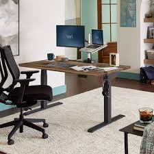Skip to the beginning of the images gallery. Electric Standing Desk 60x30 Sit To Stand Adjustable Desk Vari