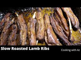 slow roasted lamb ribs cooking with